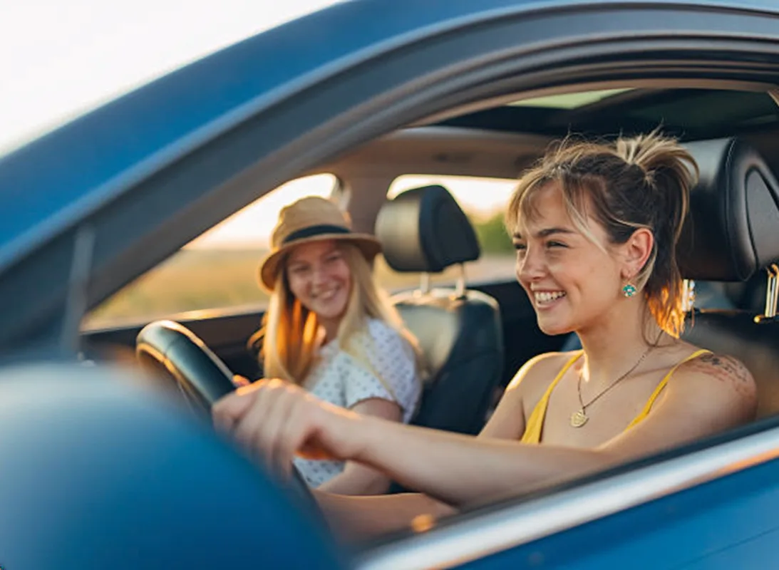 Auto Europe car rental happy travellers enjoying European road trip