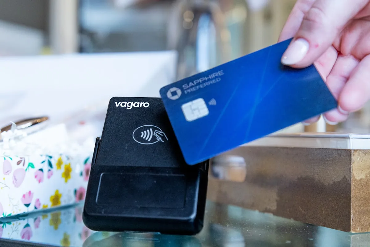 Digital nomad comparing best banks Wise Revolut and N26 on laptop in coworking space