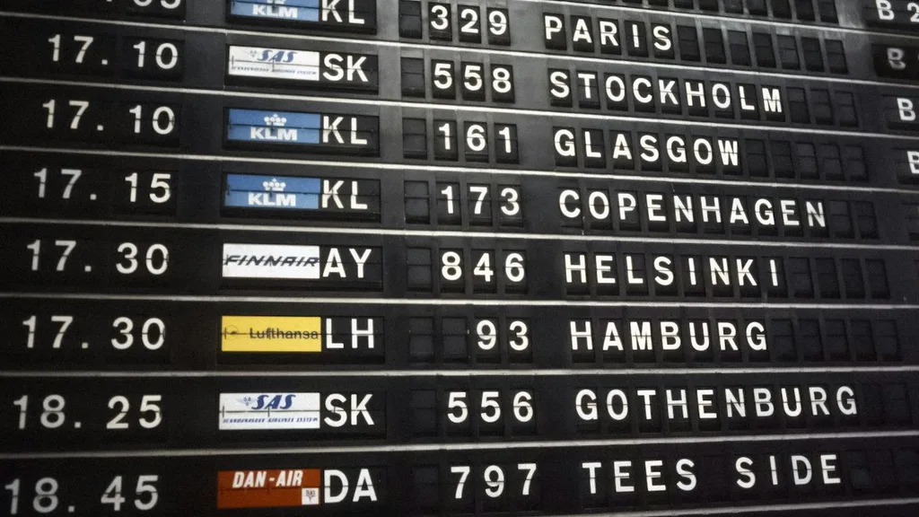 Kiwi.com airport departures board with multi-city itinerary
