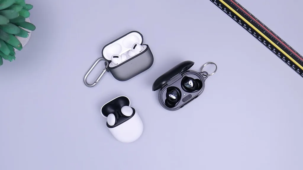 Best noise cancelling earbuds earbuds on travel desk setup for digital nomads