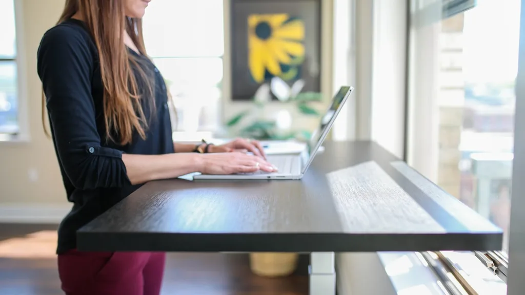 Best portable standing desk adjustable laptop stand in coworking for digital nomads
