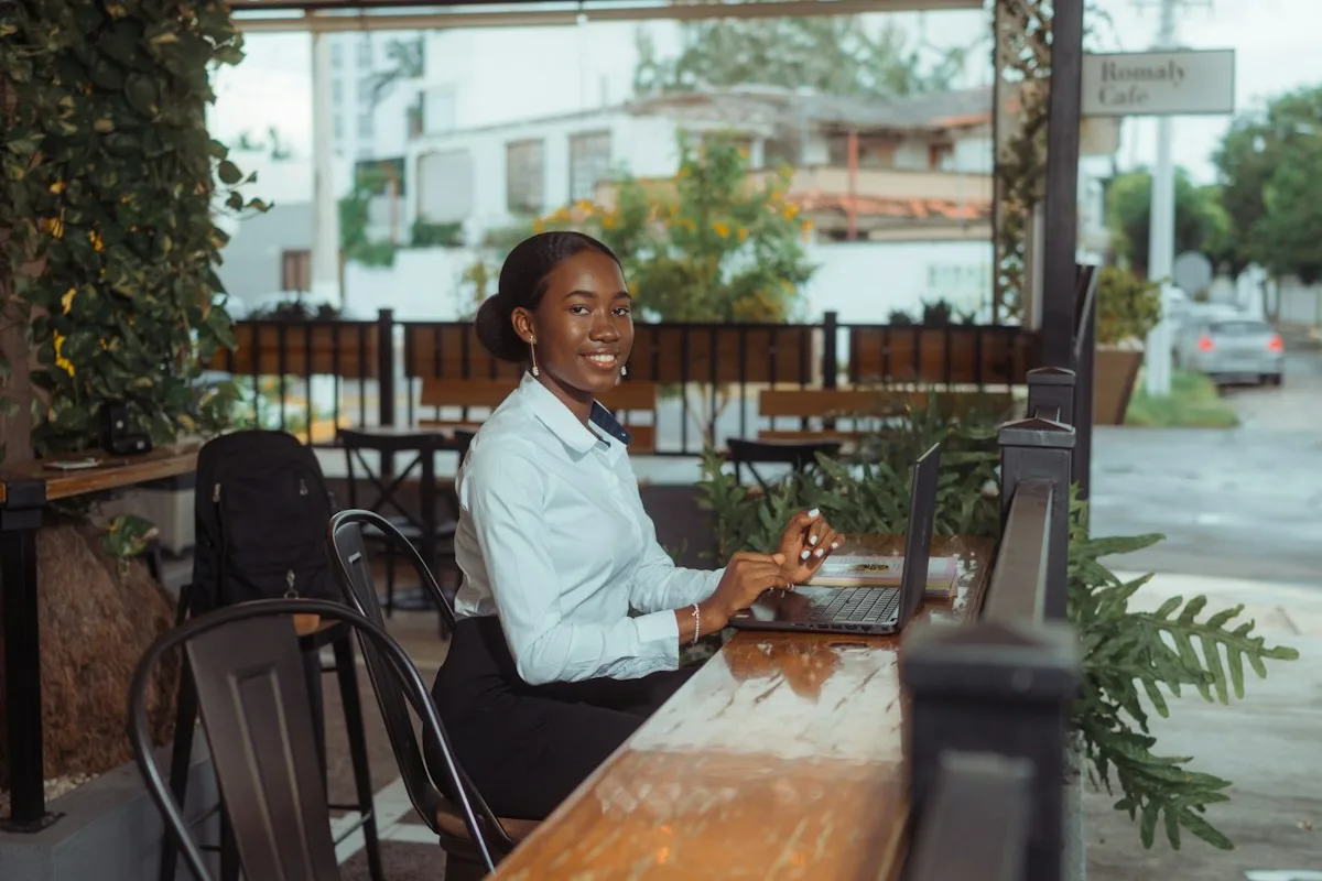 Remote contractor reviewing Deel platform for global payroll on laptop