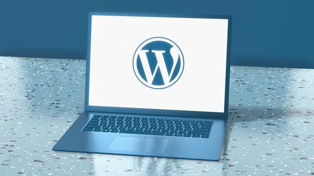 Webflow vs WordPress portfolio Webflow designer on laptop for digital nomads