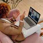 Person on a video call using a webcam while working remotely