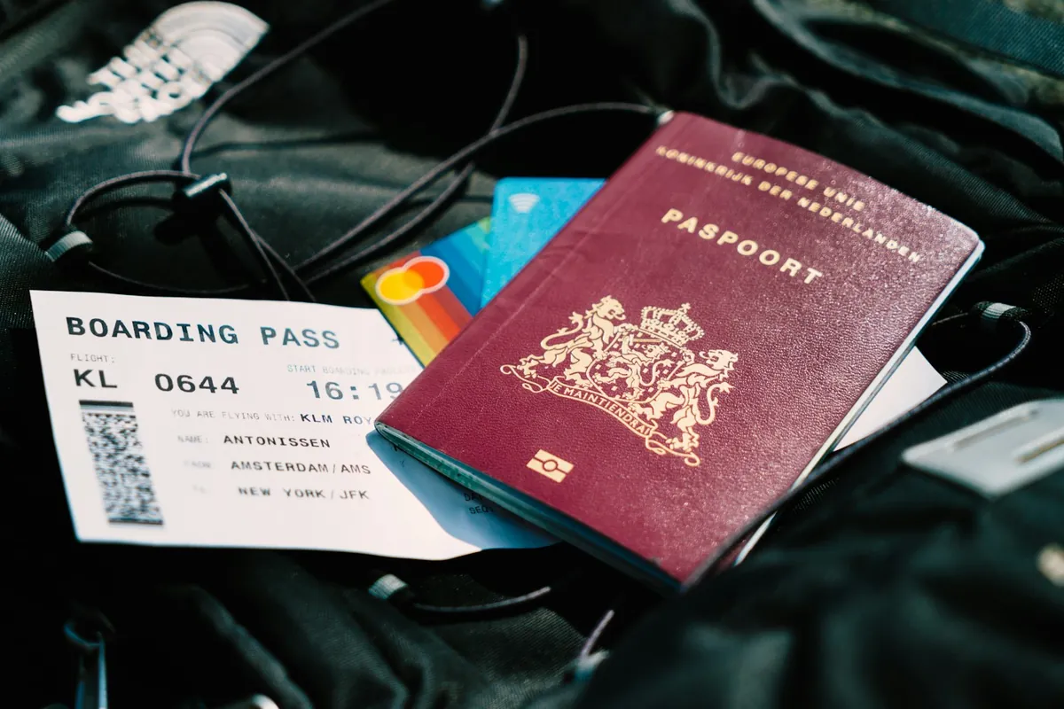 Passport, boarding pass and bank cards packed for a trip