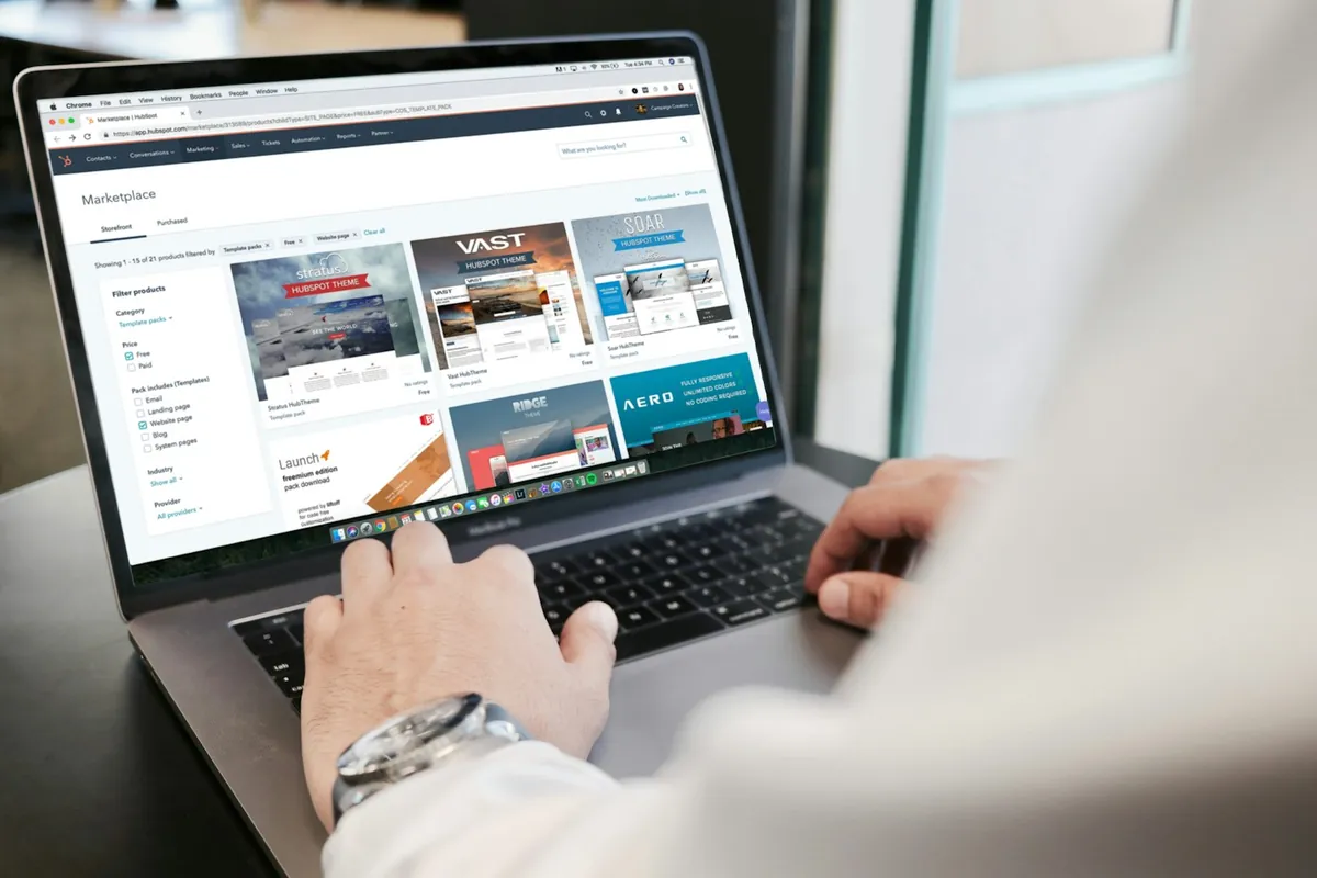 Person working on a website in a browser on a laptop