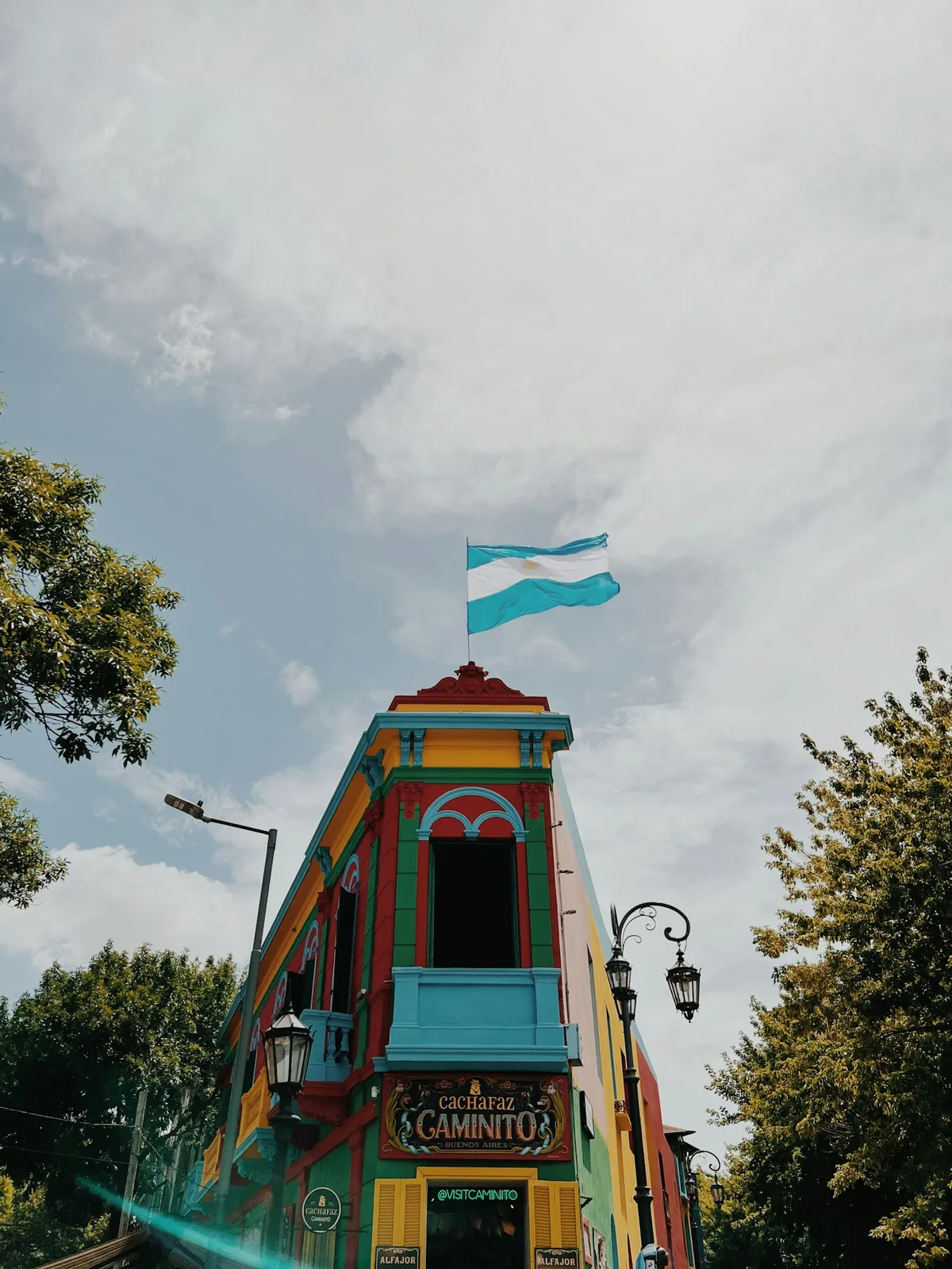 Colorful Caminito building with Argentine flag in La Boca, Buenos Aires
