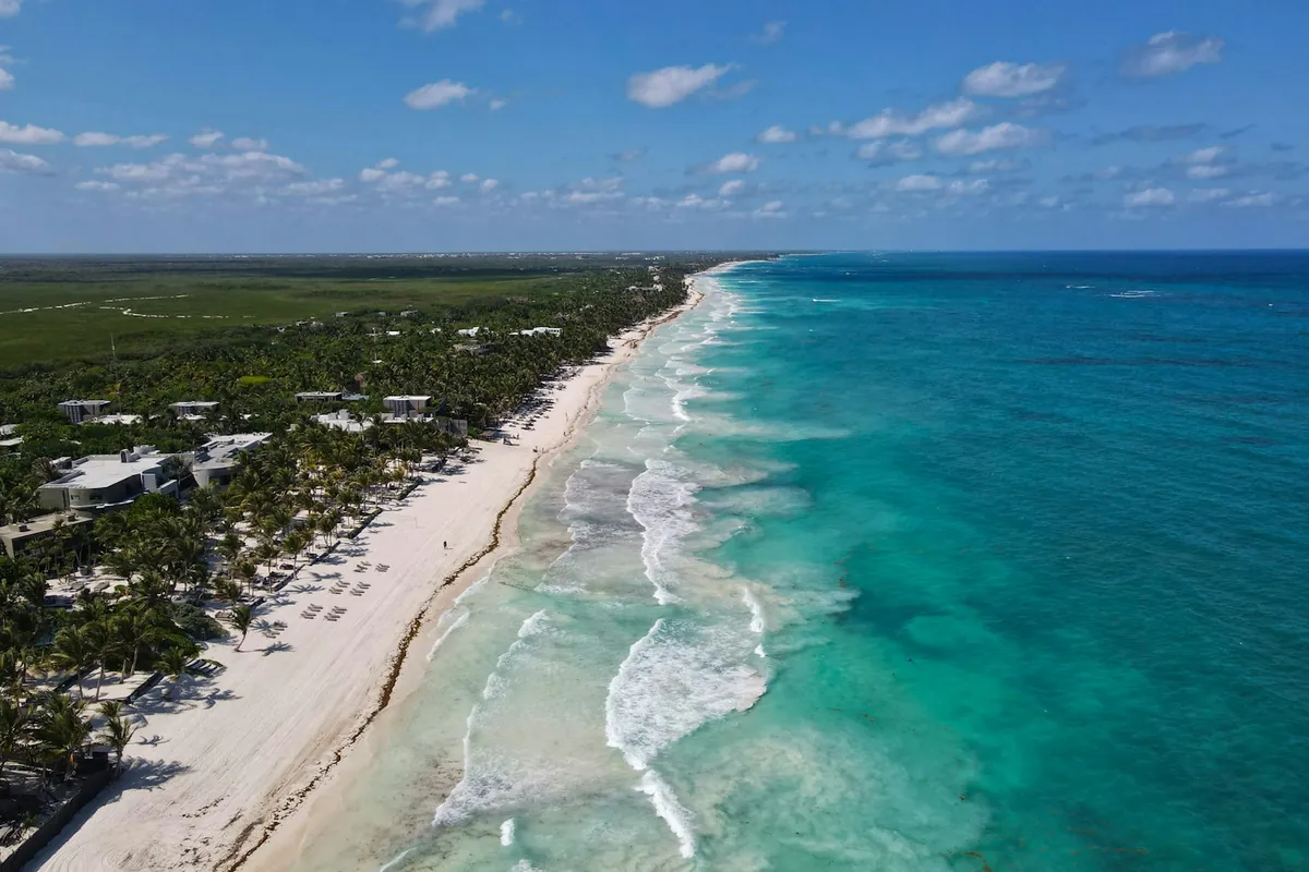 Aerial view of a white sand beach on the Caribbean coast of Mexico
