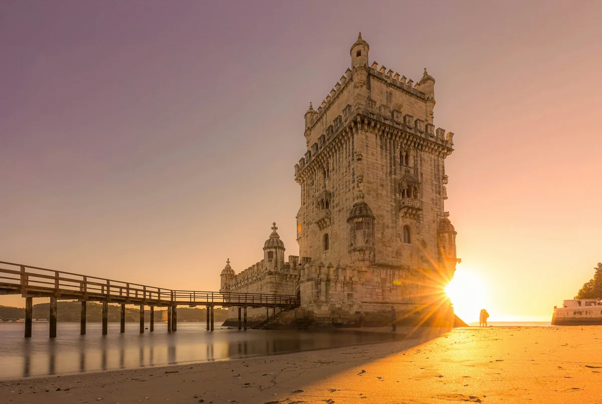 Belem Tower at sunset on the banks of the Tagus in Lisbon