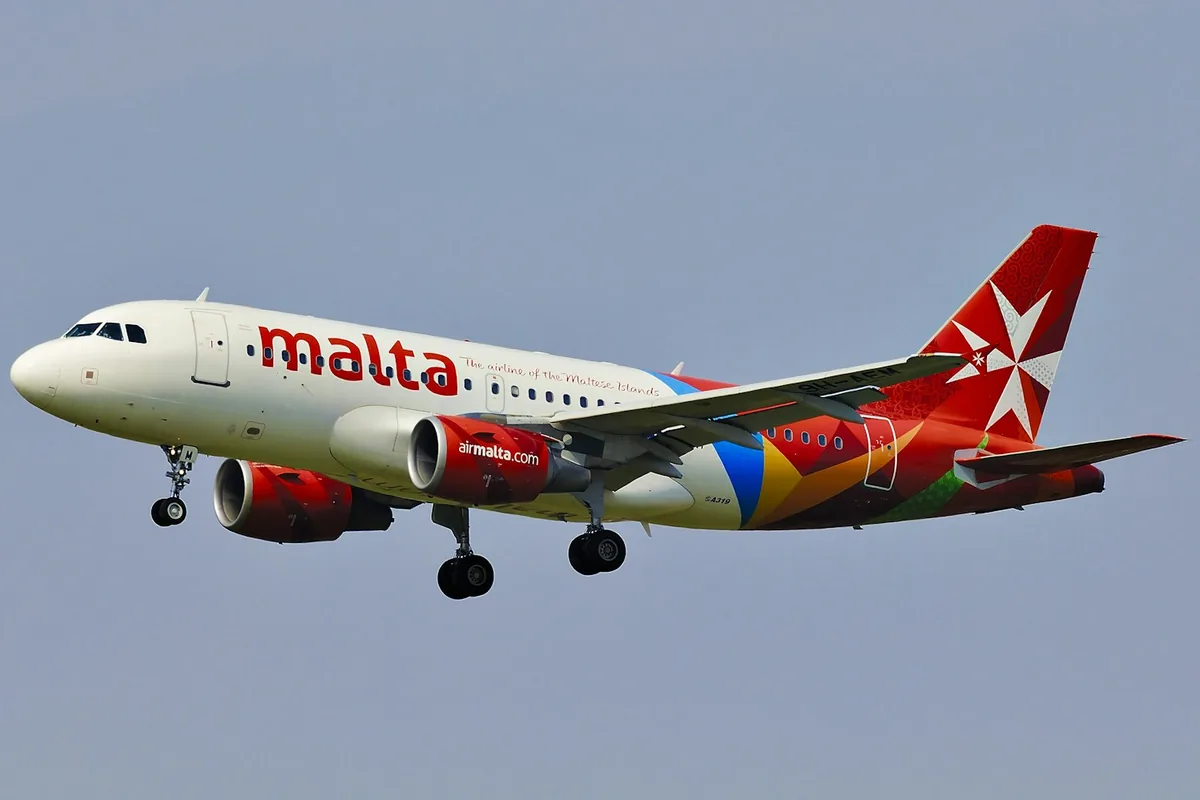An airliner in flight over Malta