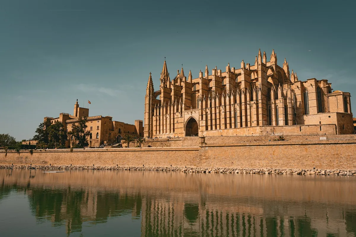 La Seu, Palma Cathedral, reflected in the water in Mallorca