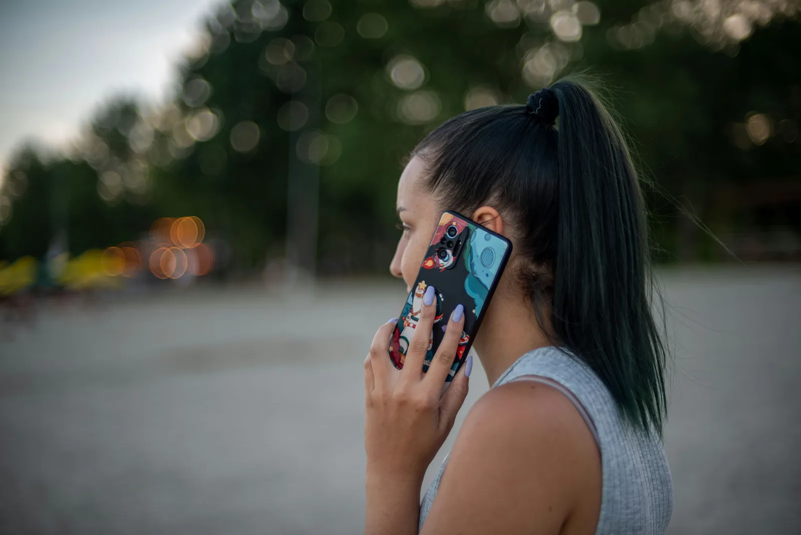 Person talking on the phone outdoors