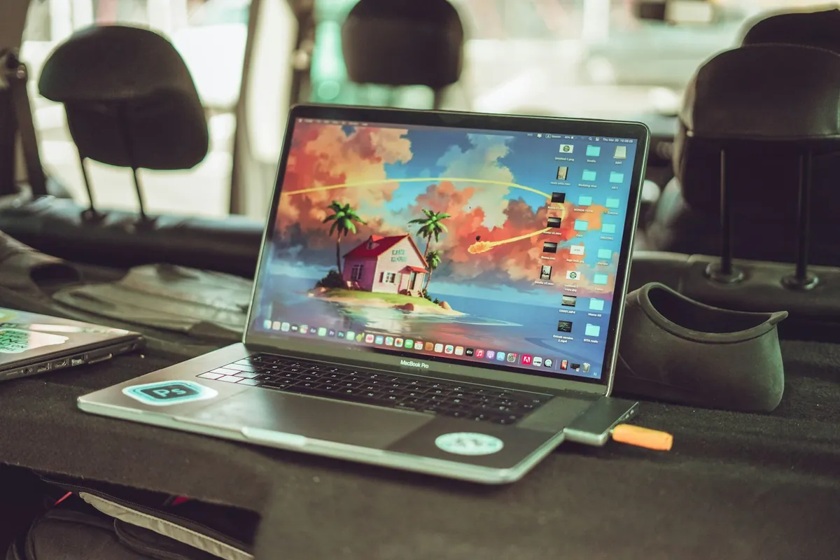 Laptop open and ready to compare rental car prices