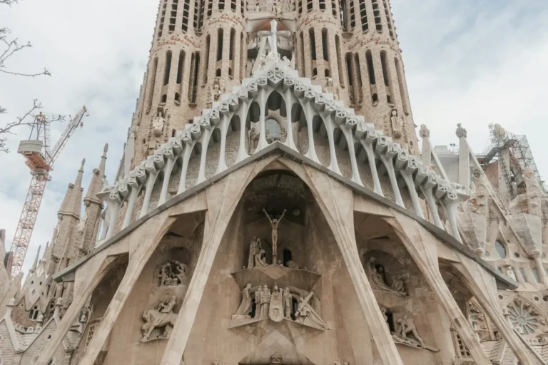 Sagrada Familia facade against a blue sky in Barcelona