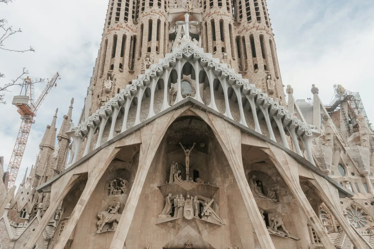 Sagrada Familia facade against a blue sky in Barcelona
