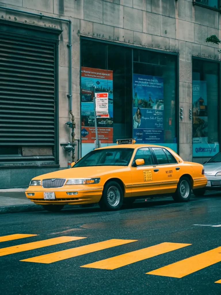 Yellow taxi cab on a city street