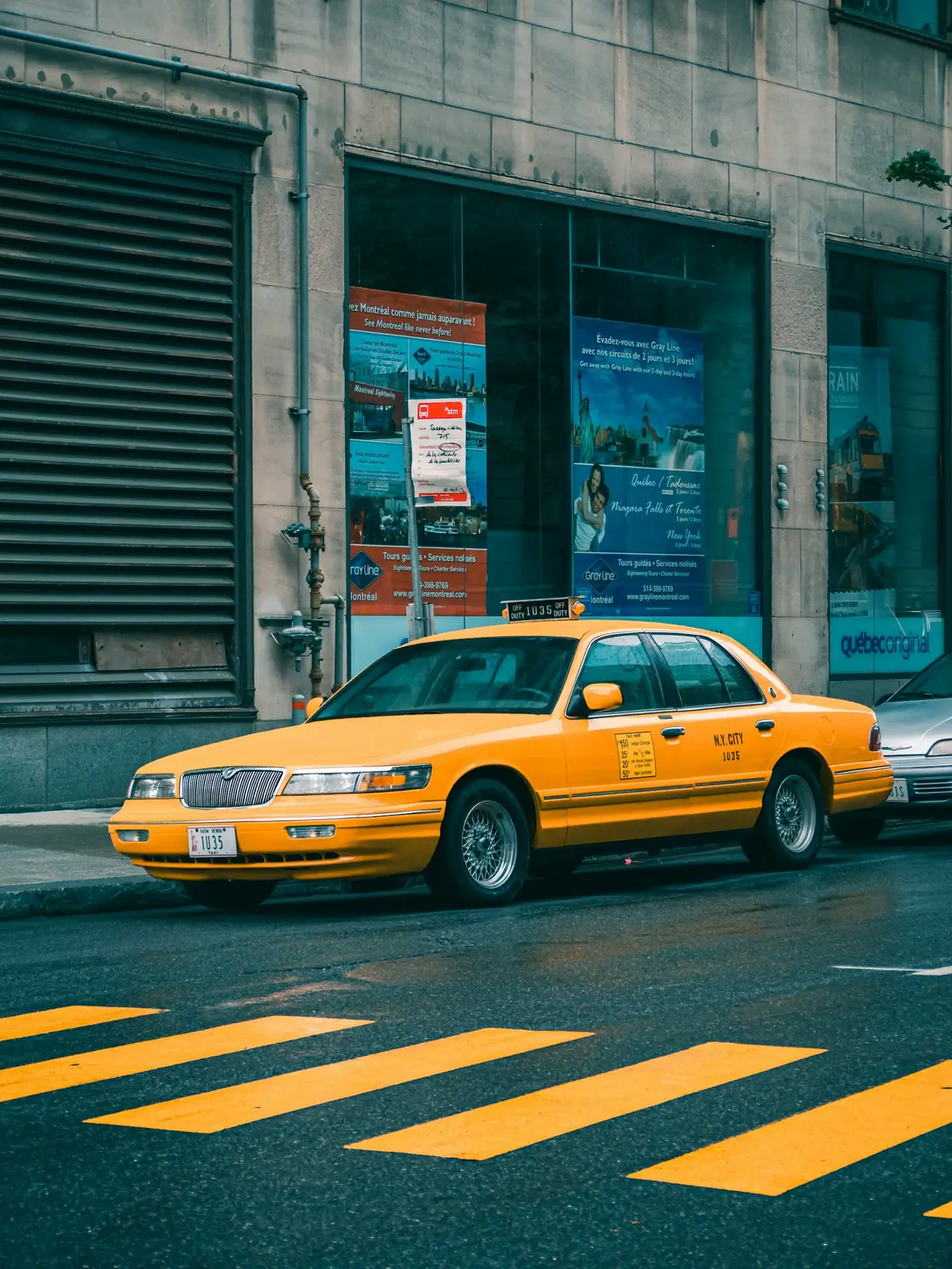 Yellow taxi cab on a city street