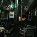 Traveler sleeping on a night bus