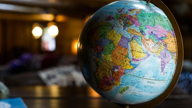 Desk globe on a table, best countries for digital nomads