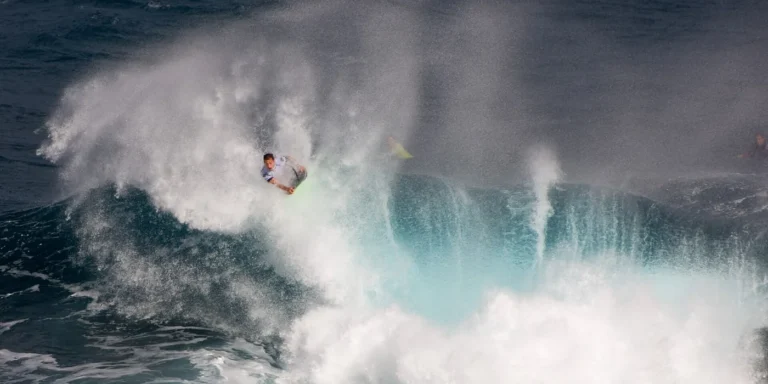 Bodyboarder falling off a huge breaking wave at El Fronton, Gran Canaria
