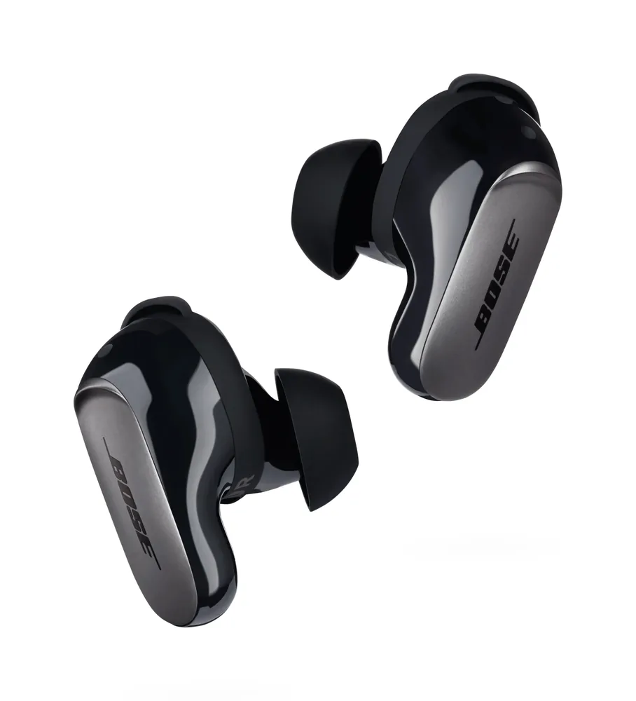 Pair of black Bose QuietComfort Ultra Earbuds floating on a white background