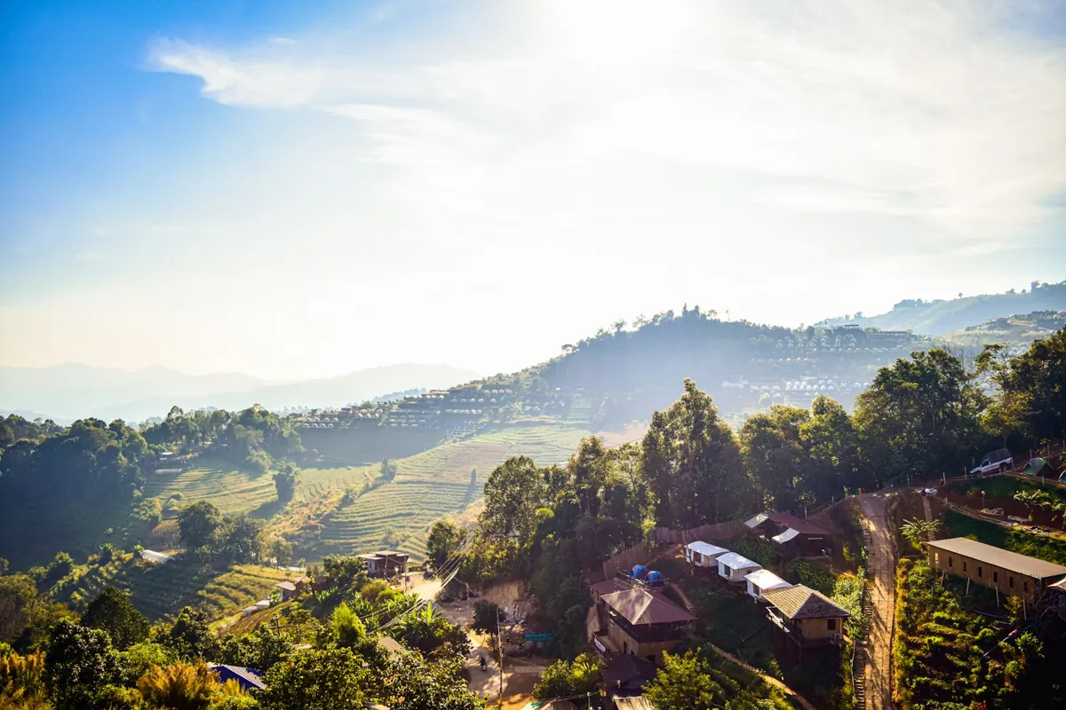 Hazy hills and a mountain village in northern Thailand