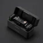 DJI Mic 2 charging case open with two transmitters and one receiver inside