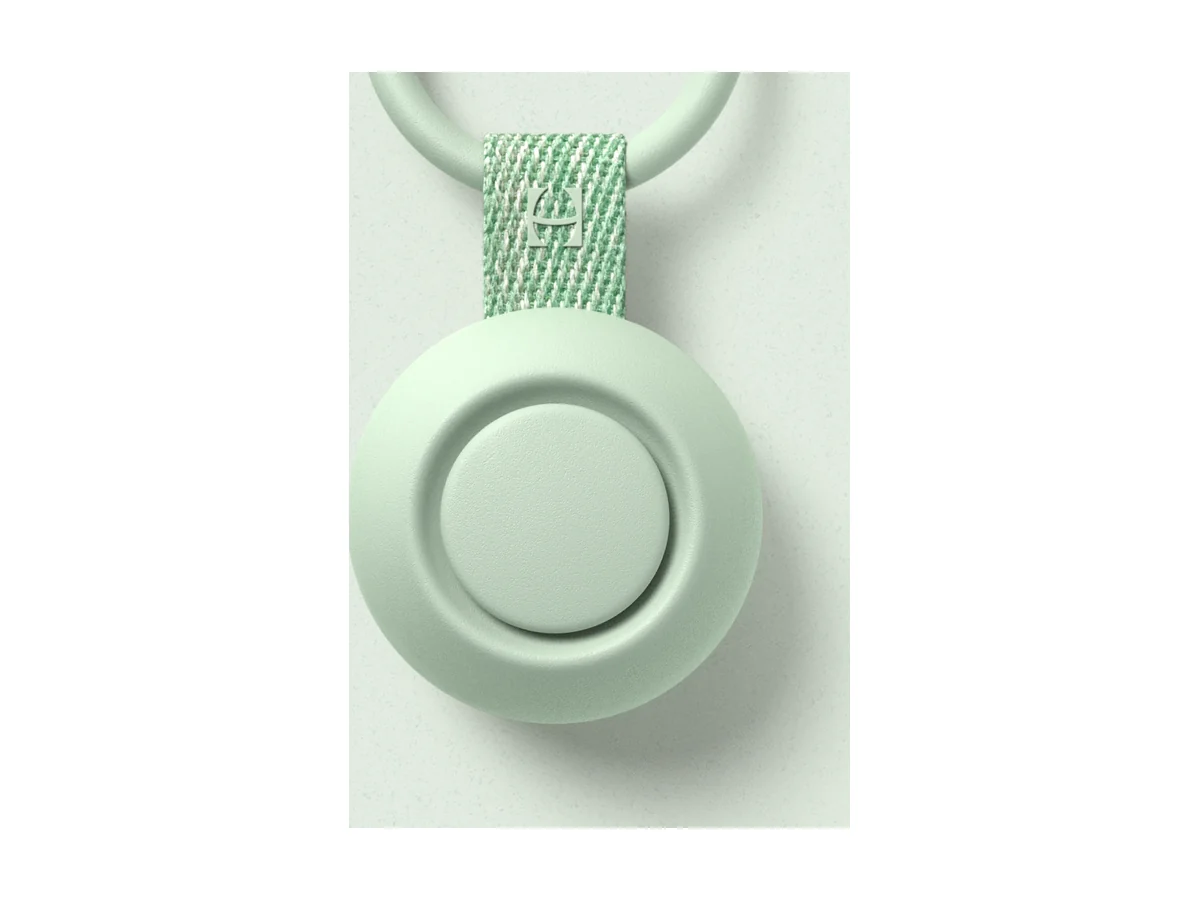 Hatch Go draagbare sound machine in mintgroen met zijn ring