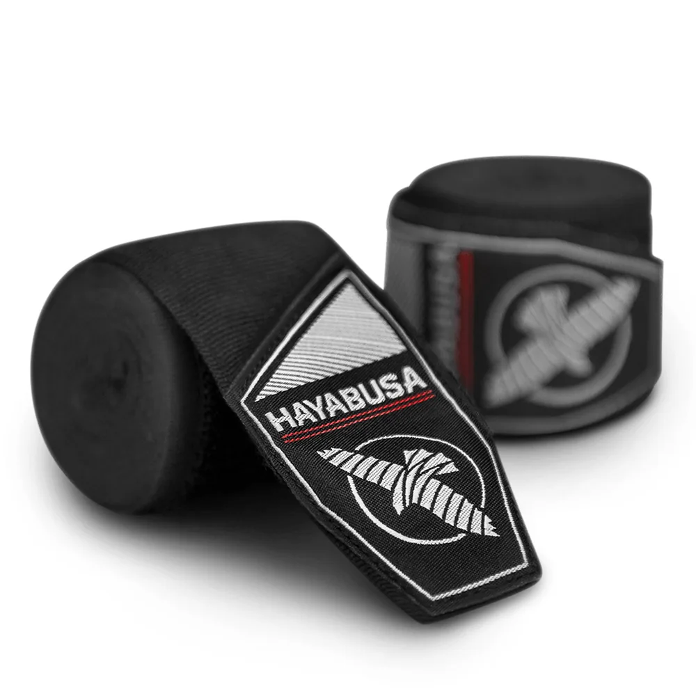 Hayabusa Perfect Stretch boxing hand wraps in black, one rolled and one unrolled