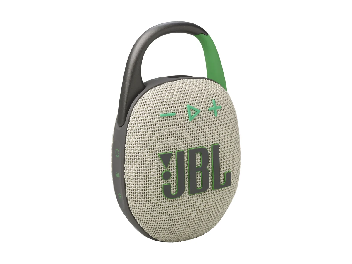 JBL Clip 5 mini Bluetooth speaker in sand with a green carabiner