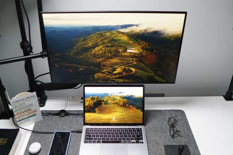 Laptop, external monitor and smartphone on a desk