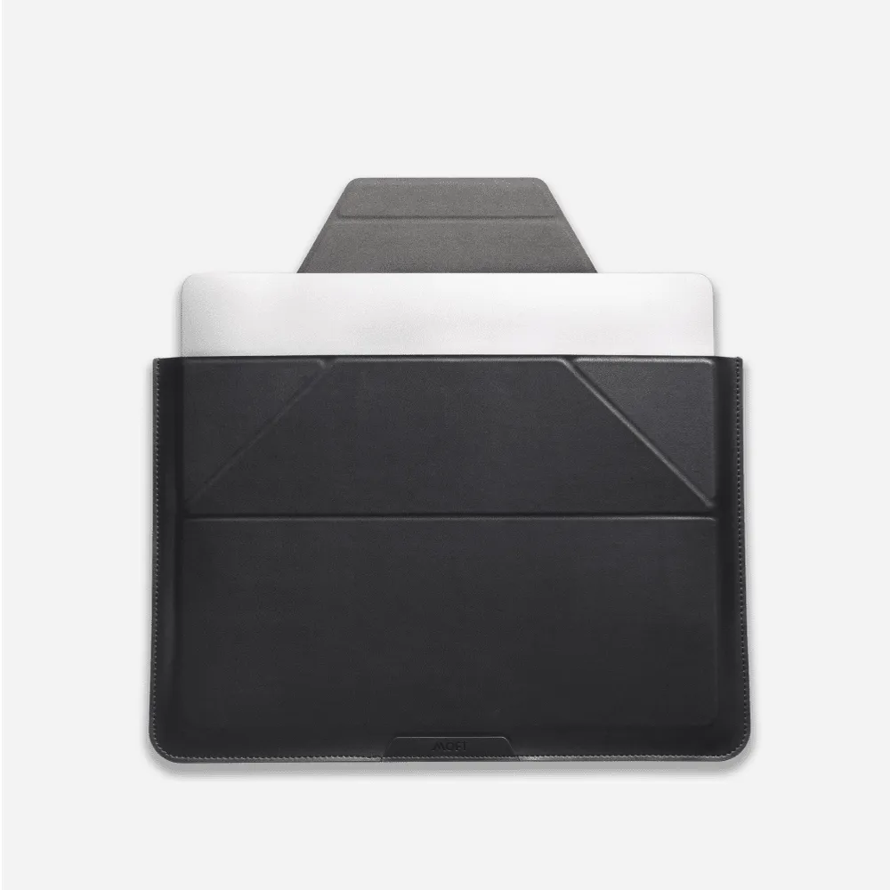 MOFT Laptop Carry Sleeve with built-in stand in black, a laptop sliding out of the sleeve