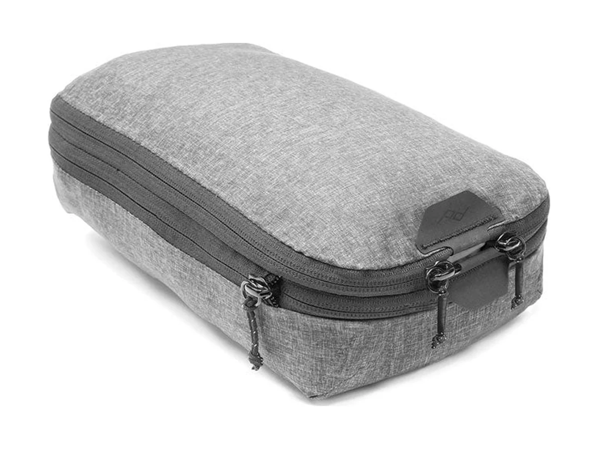 Peak Design packing cube in grey with an expansion zip around the side