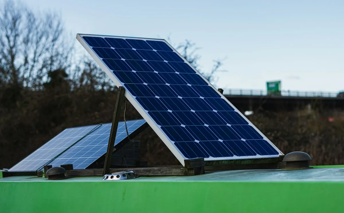 Rigid solar panels tilted up on a roof