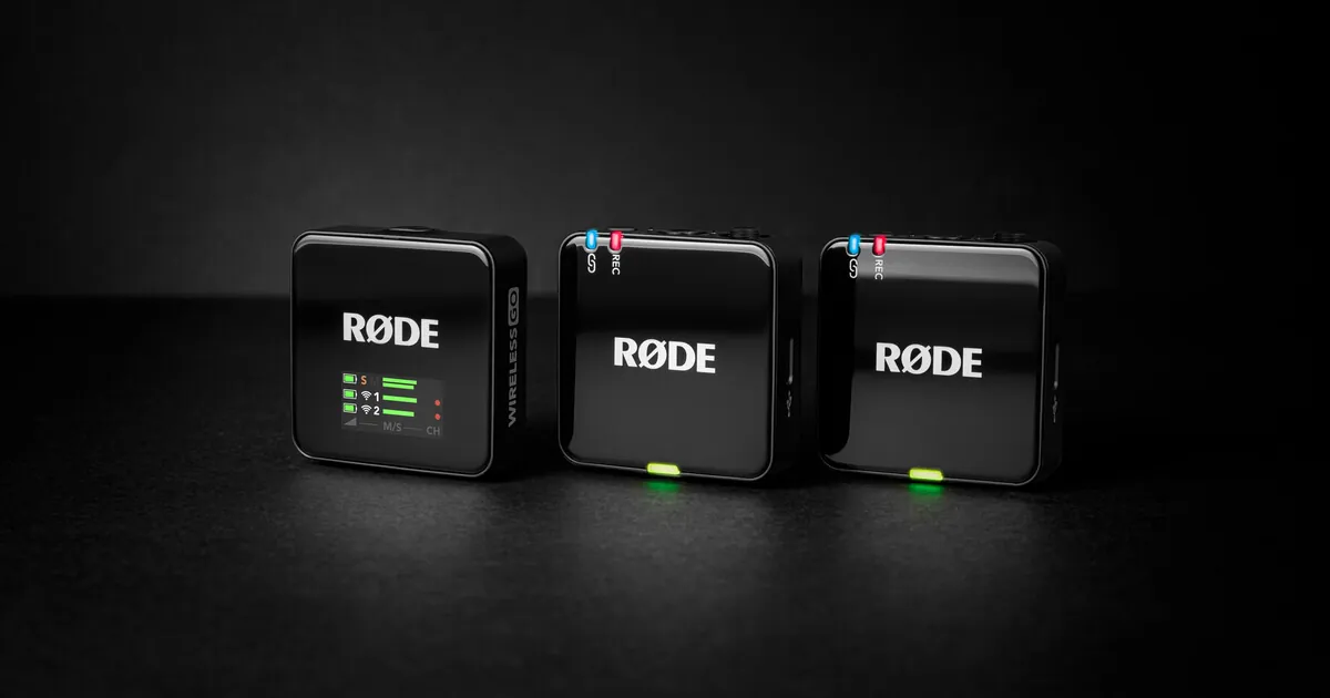 RODE Wireless GO (Gen 3) receiver and two transmitters lined up on a dark surface