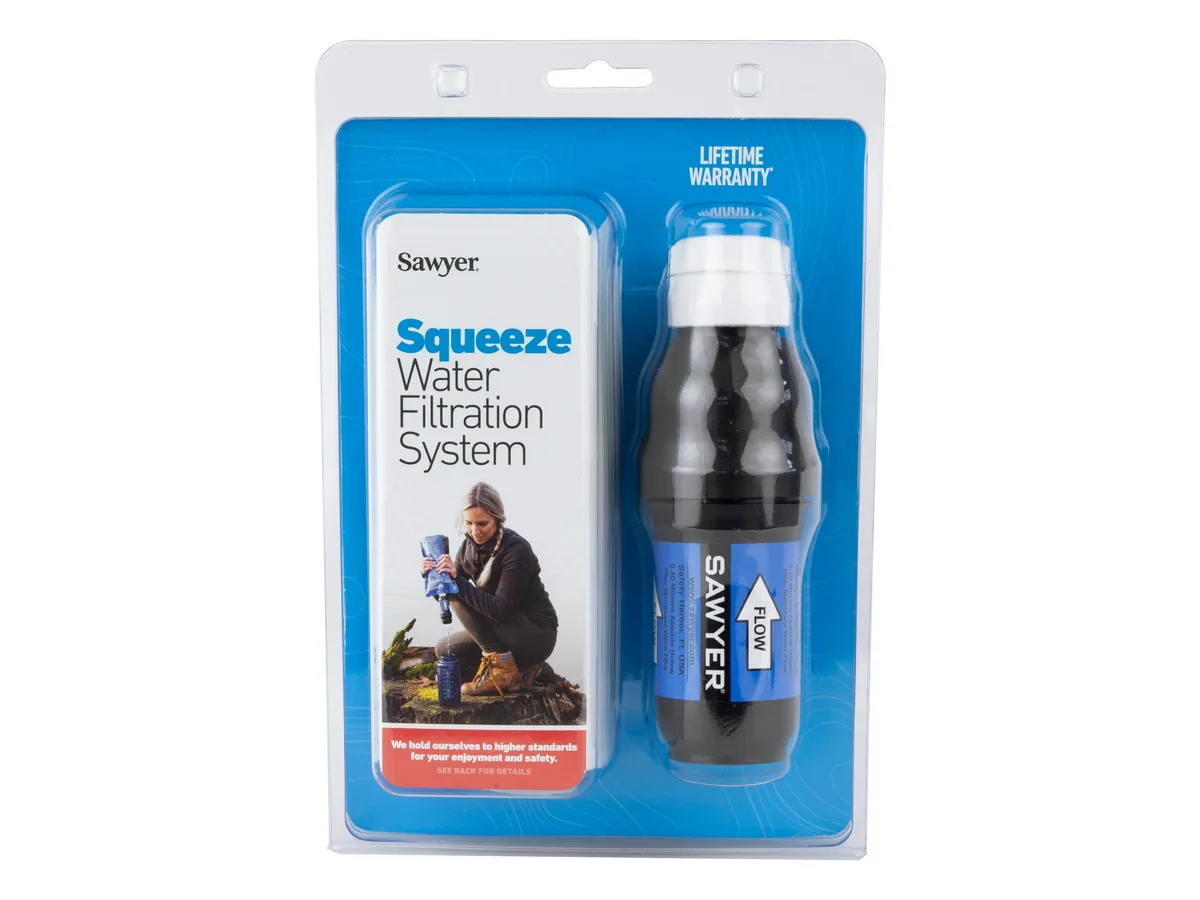 Sawyer Squeeze water filter in its blue retail package next to a card showing a hiker filling a bottle