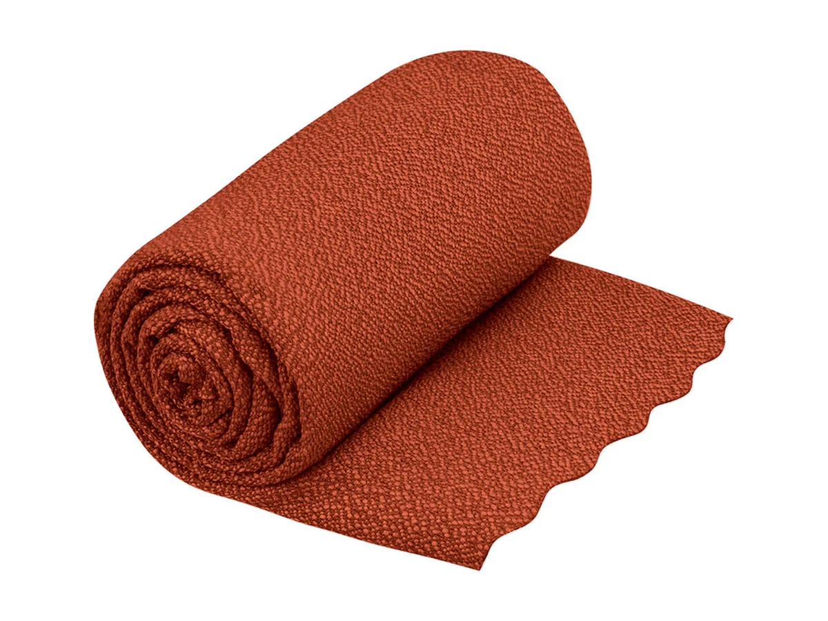 Sea to Summit Airlite ultralight towel, rolled, in orange red