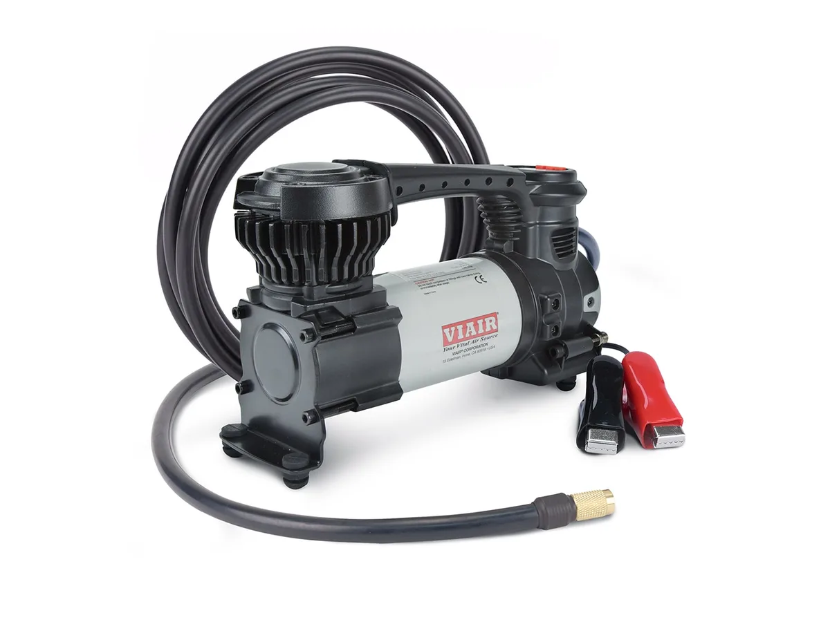 VIAIR EVC88P 12 V tire inflator with coiled hose and battery clamps, a pump for camper van tires